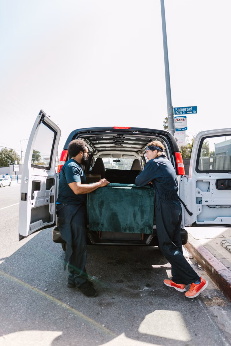 Furniture being loaded for Dallas junk removal